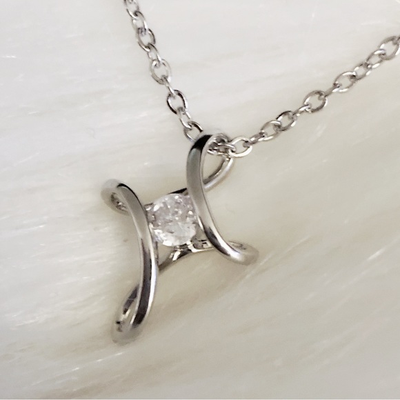 925 Sterling Silver Swirly Cross Necklace with 1/4ct Synthetic Diamond - Picture 9 of 9